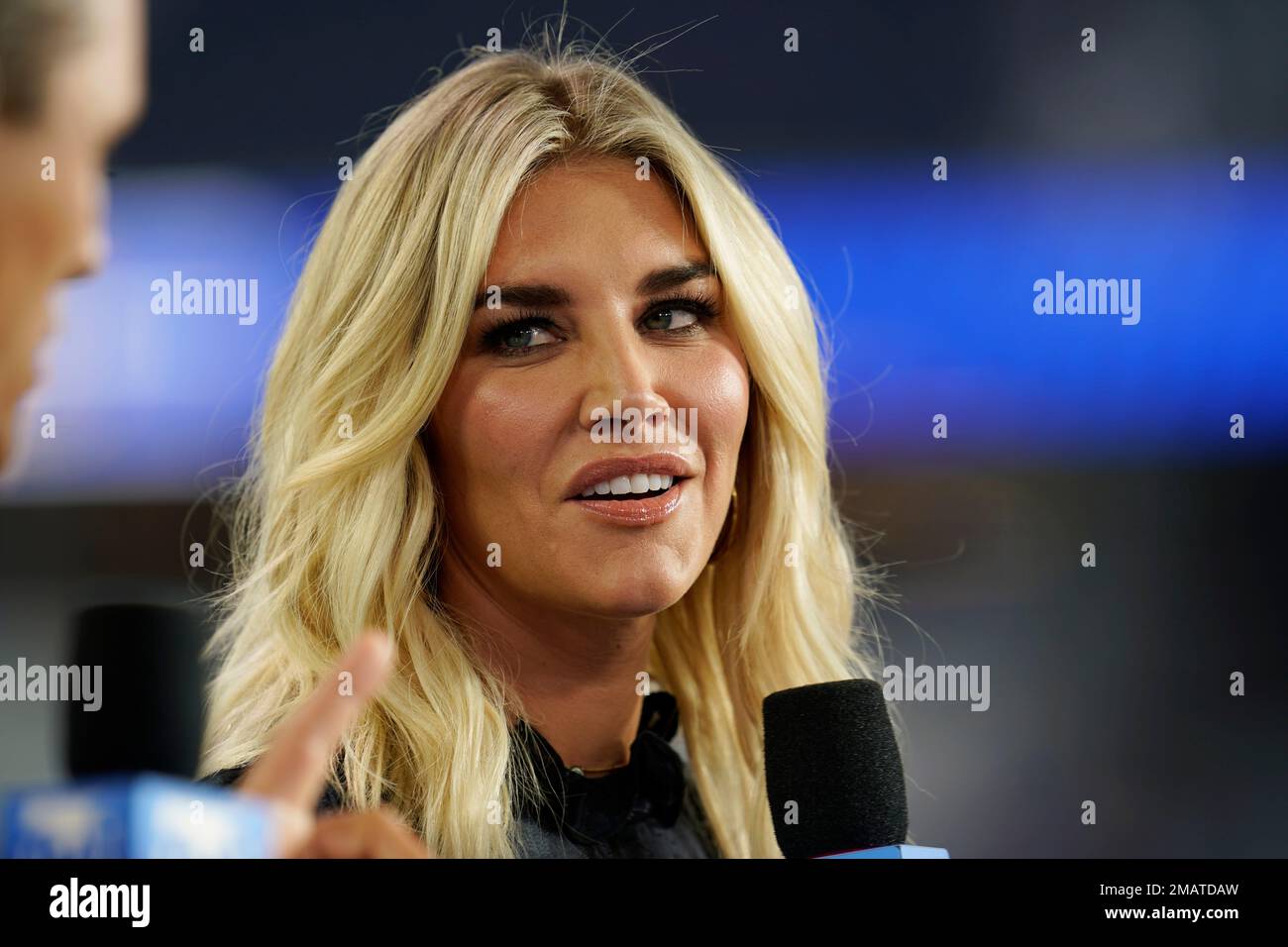 Reporter Charissa Thompson talks in the Amazon Prime Video broadcast booth before a preseason NFL football game between the Los Angeles Rams and the Houston Texans Friday, Aug