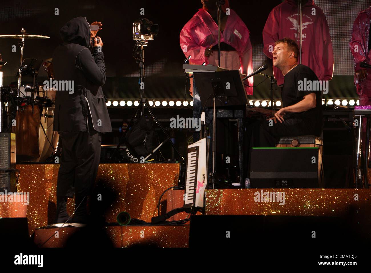 Yasiin Bey and Damon Albarn of Gorillaz perform on stage at All