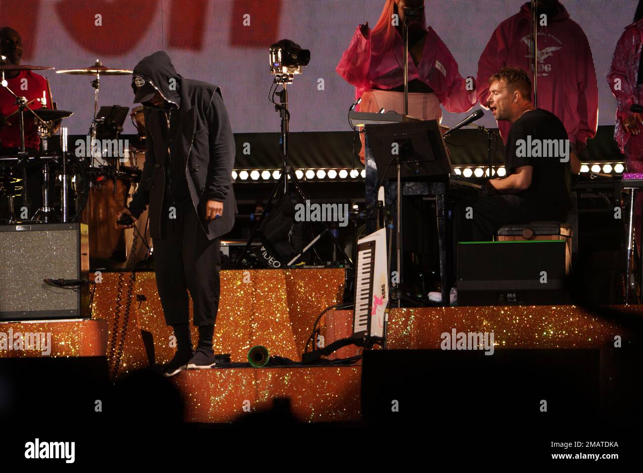 Yasiin Bey and Damon Albarn of Gorillaz perform on stage at All