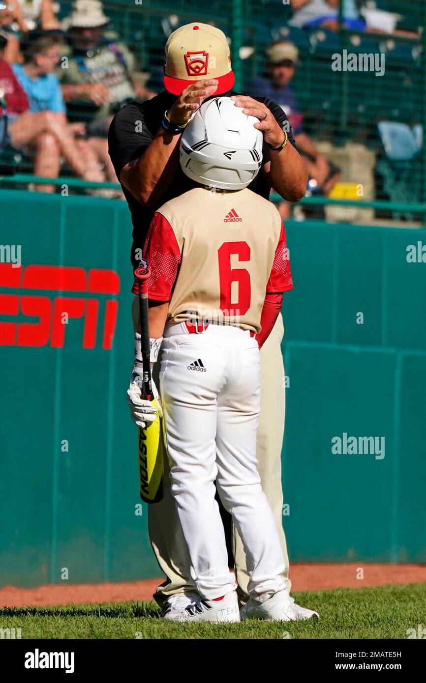 Brothers coach against each other in Little League game