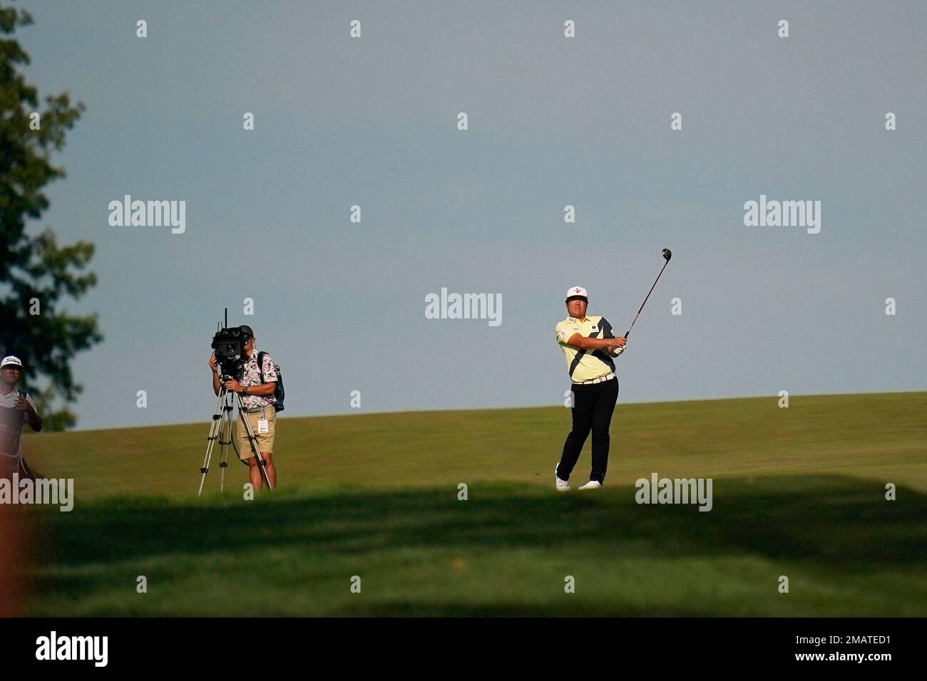 Sungjae Im, of South Korea, watches his shot on the 12th hole during ...