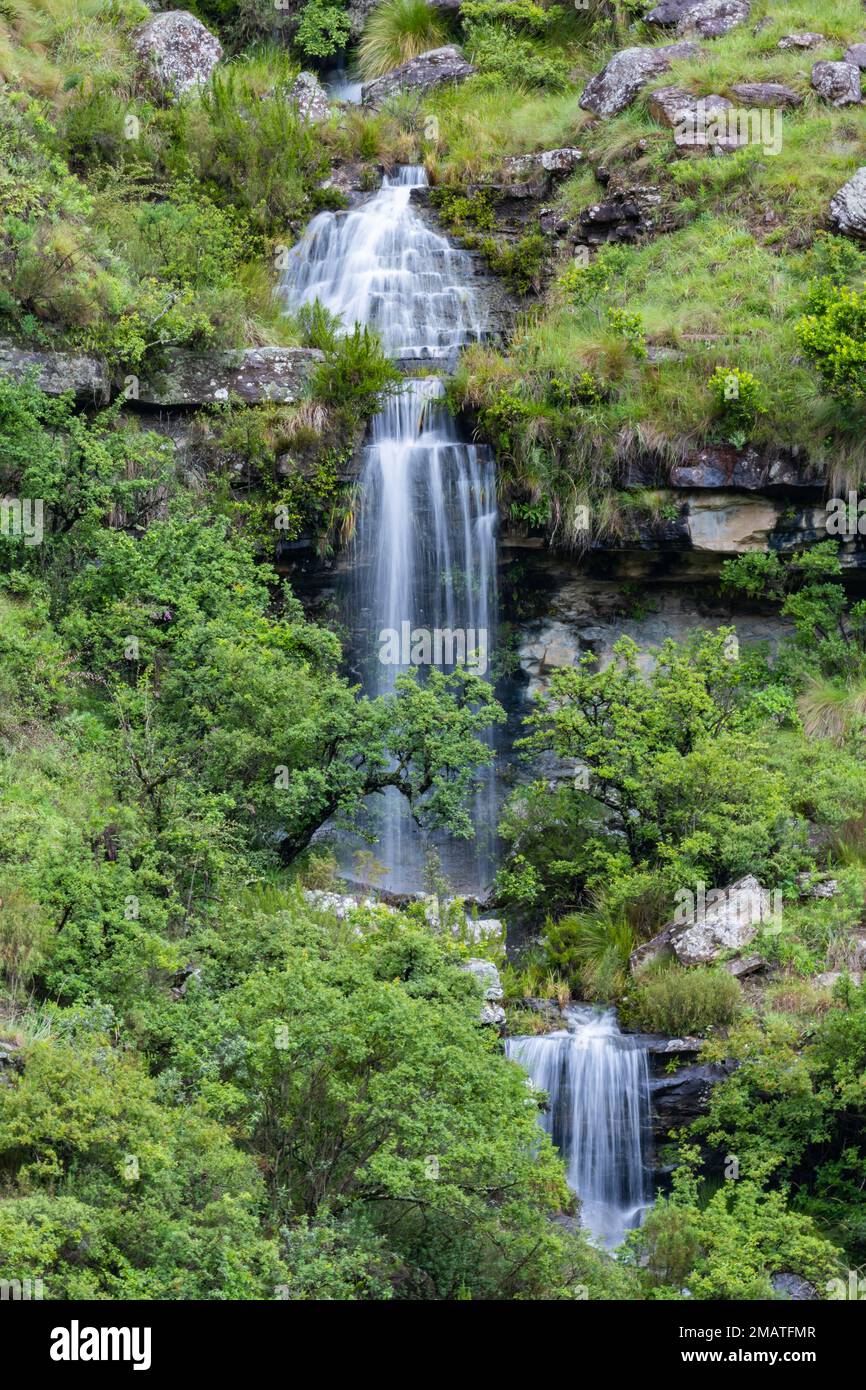 A cascade waterfalls on the side of Drakensberg Mountains, KwaZulu Natal, South Africa. Stock Photo