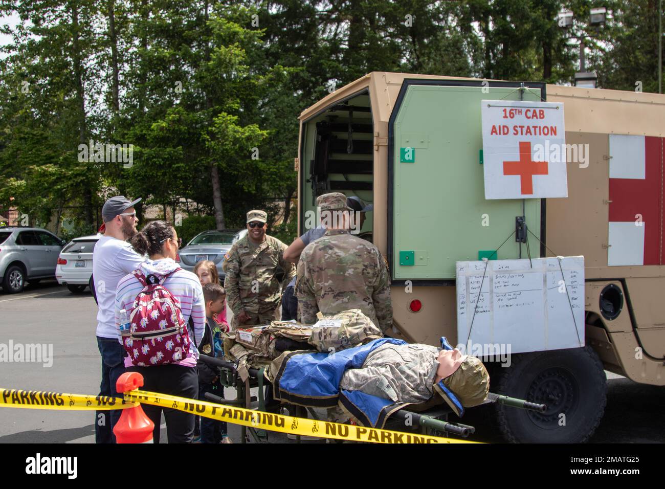 Soldiers assigned to Headquarters Support Company, 46th Aviation Support Battalion, 16th Combat Aviation Brigade, conduct a static display of a M997 Field Litter Ambulance at University Place, Wash. on Jun. 4, 2022. They were supporting the West Pierce Fire Rescue Open House at the terminus of the 'Duck Daze' parade. Stock Photo