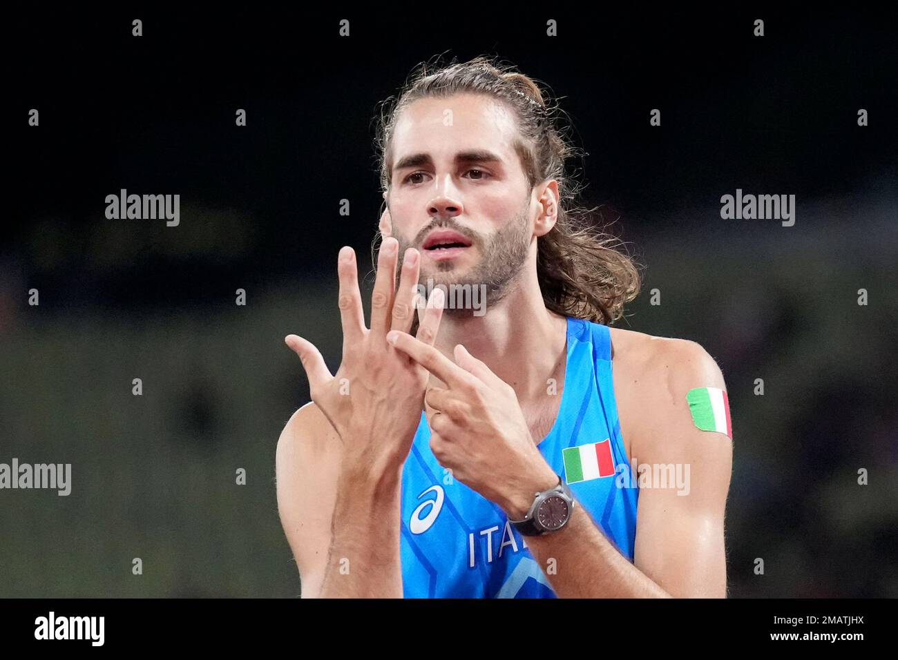Gold medalist Gianmarco Tamberi, of Italy, gestures during the Men's
