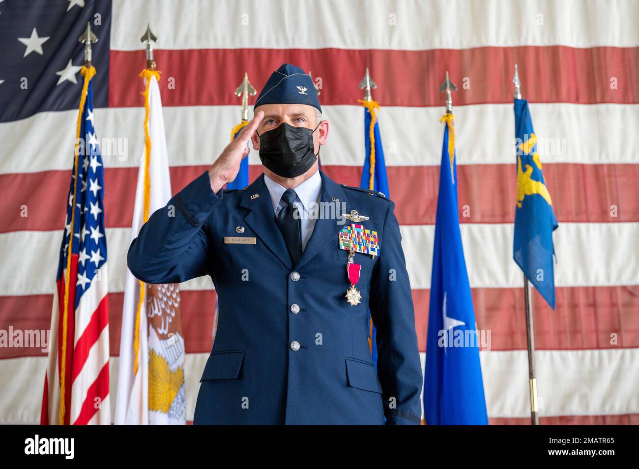 U.S. Air Force Col. Rusty Ballard, the commander of the 182nd Airlift Wing, Illinois Air National Guard, salutes the wing during a change of command ceremony in Peoria, Illinois, June 7, 2022. Outgoing wing commander Col. Daniel McDonough then assumed command of the Illinois Air National Guard from Maj. Gen. Peter Nezamis. Stock Photo