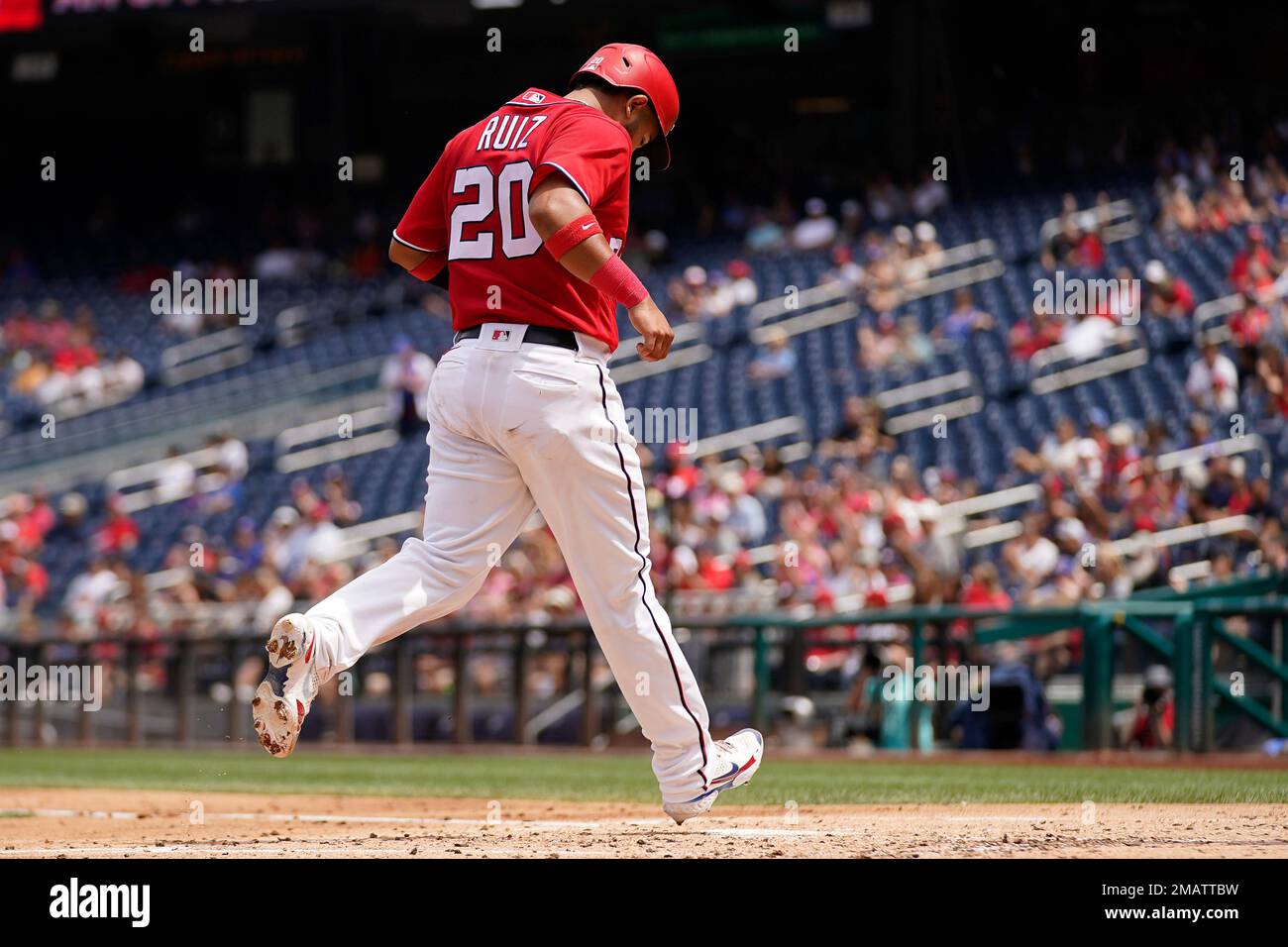 Washington Nationals' Keibert Ruiz scores on a single during the second  inning of a baseball game against the Chicago Cubs at Nationals Park  Wednesday, Aug. 17, 2022, in Washington. (AP Photo/Andrew Harnik