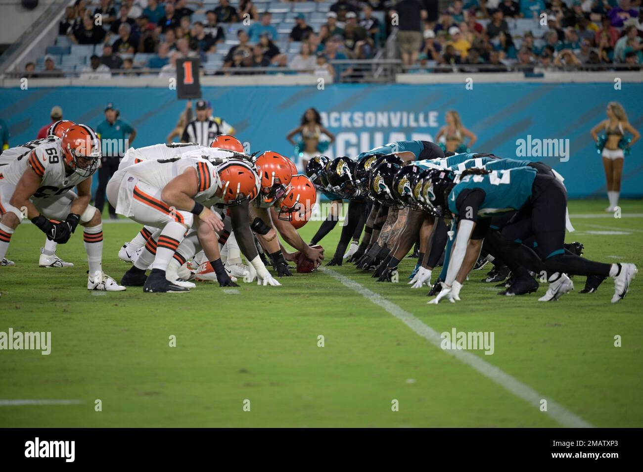 The Cleveland Browns offense and the Jacksonville Jaguars defense line up  at the line of scrimmage during the first half of a preseason NFL football  game, Friday, Aug. 12, 2022, in Jacksonville,