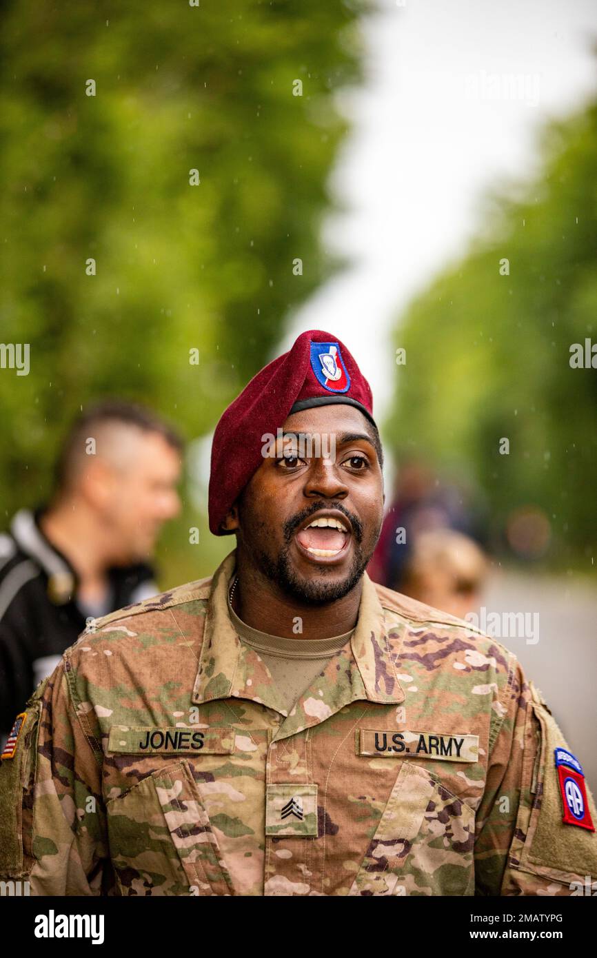 Paratroopers assigned to the 82nd Airborne Division march to Sainte