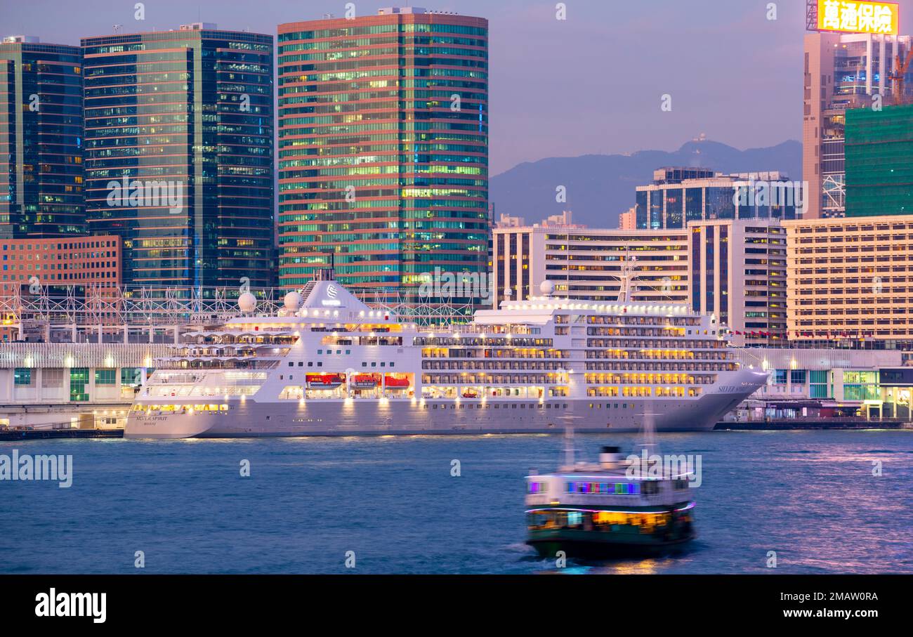 The first International cruise ship in three years sails into Hong Kong since the start of the pandemic. The Silver Spirit, docked at Ocean Terminal. Stock Photo