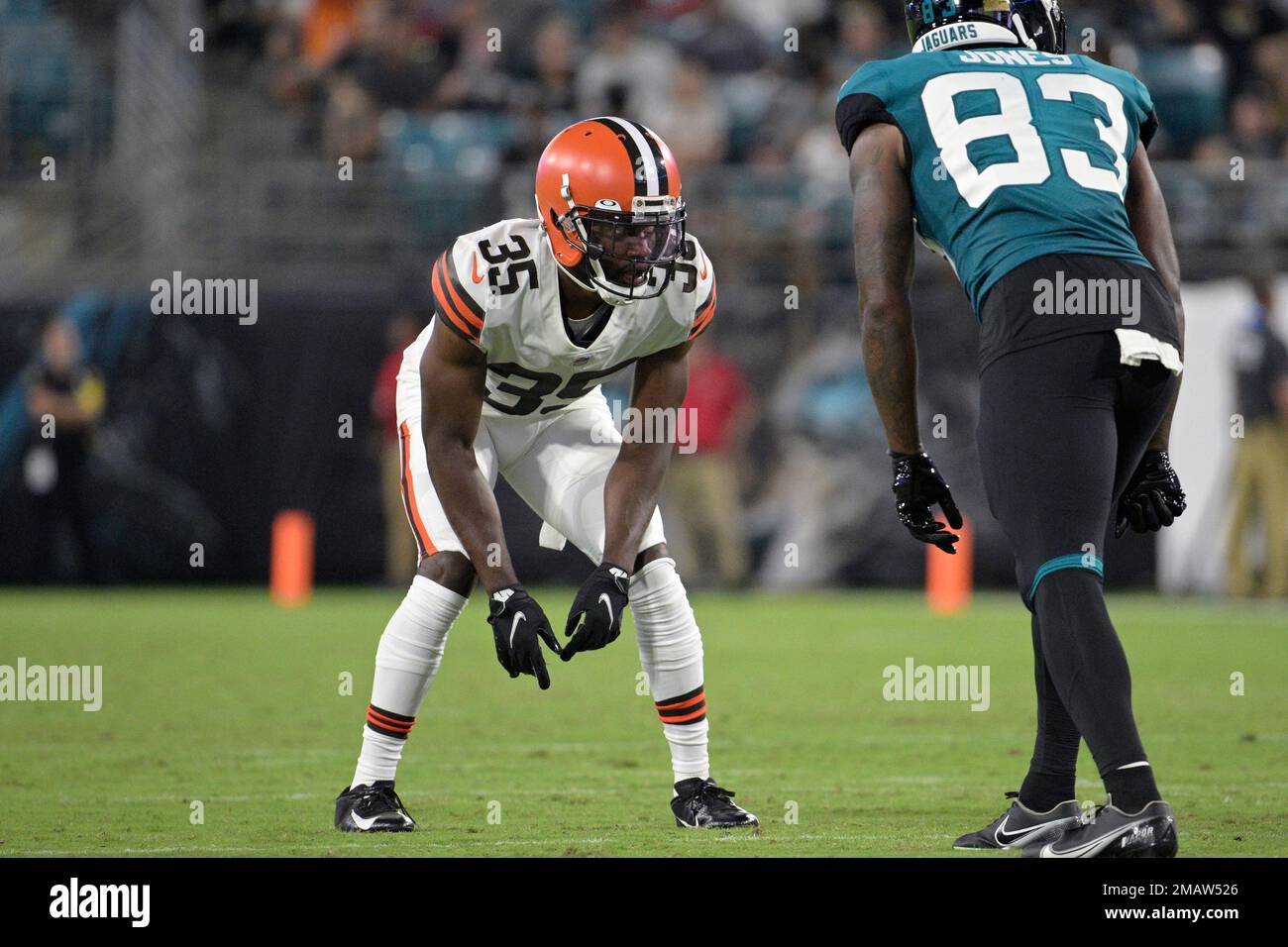 Cleveland Browns safety Jovante Moffatt (35) defends against Jacksonville  Jaguars wide receiver Tim Jones (83) during the second half of a preseason  NFL football game, Friday, Aug. 12, 2022, in Jacksonville, Fla. (