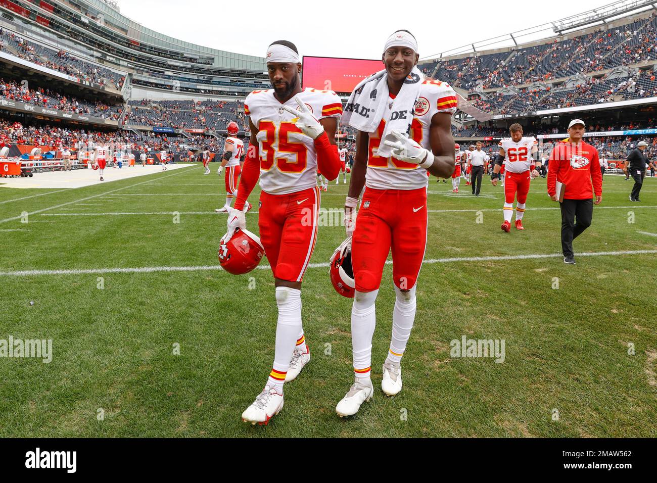 Kansas City Chiefs cornerbacks Jaylen Watson, left, and Joshua Williams,  right, walk off the field after a preseason NFL football game against the  Chicago Bears, Saturday, Aug. 13, 2022, in Chicago. (AP