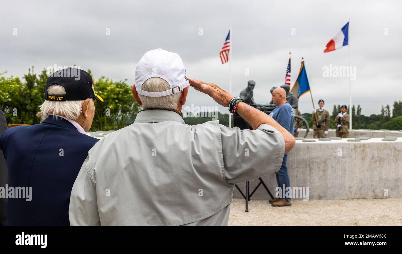 Veterans render a salute during a monument reveal ceremony honoring ...