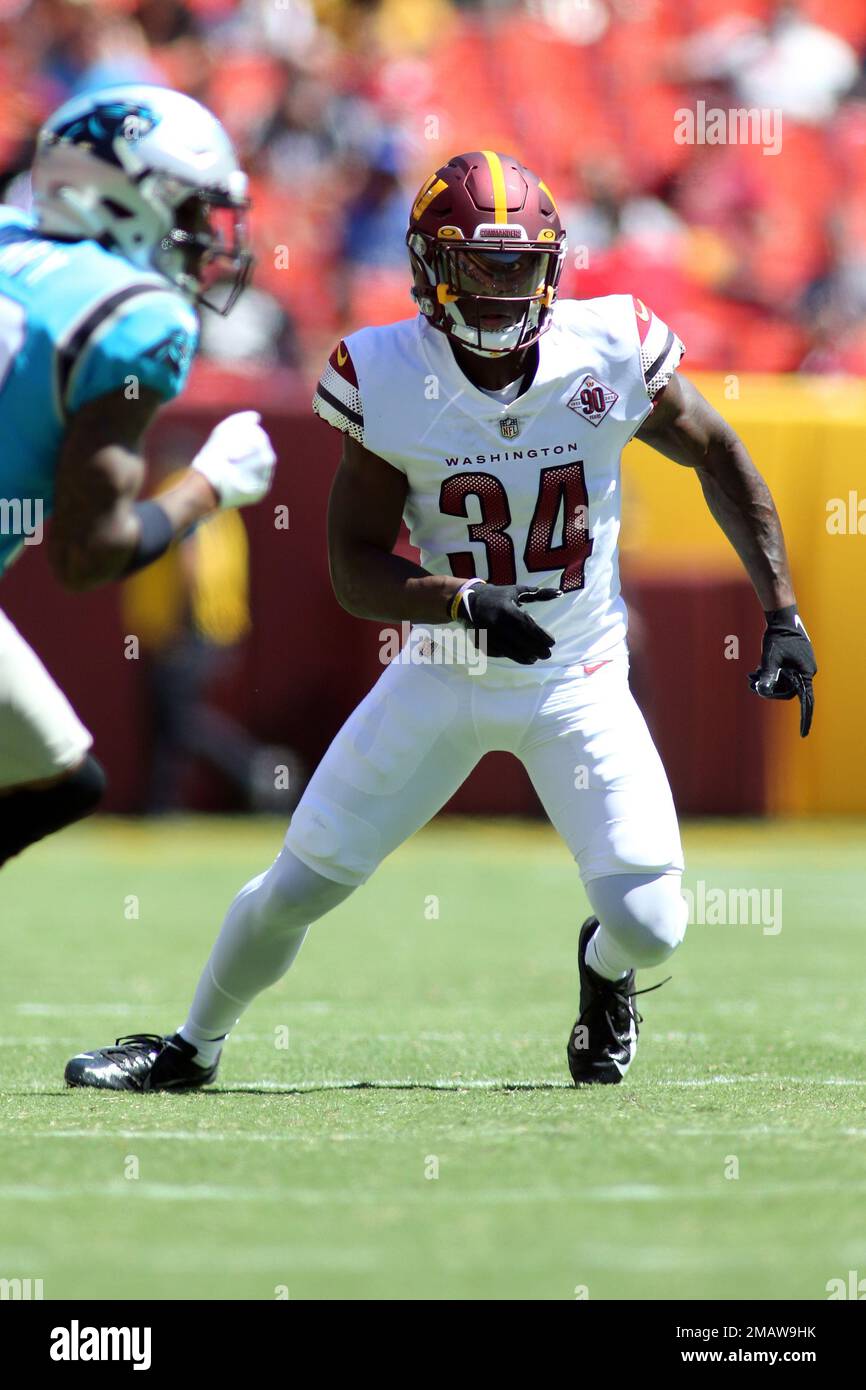 Washington Commanders cornerback Christian Holmes (34) runs during an NFL  football game against the Carolina Panthers, Saturday, Aug. 13, 2022 in  Landover. (AP Photo/Daniel Kucin Jr Stock Photo - Alamy