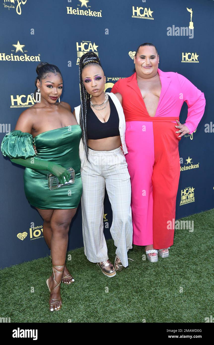 Sydney Bell, from left, Nneka Onuorah and Jayla Sullivan arrive at the