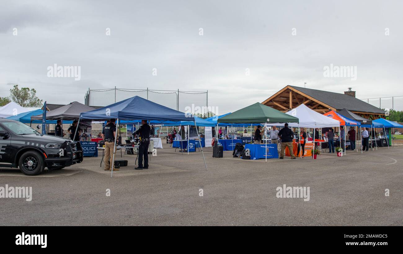 Members of the Idaho National Guard visit a job fair hosted by the
