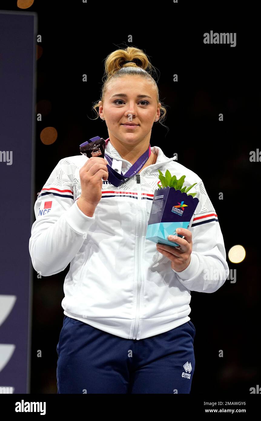Bronze medal winner France's Lorette Charpy poses on the podium during