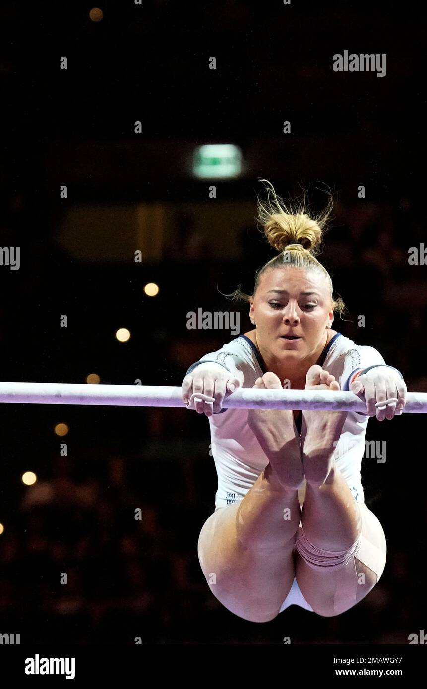 France's Lorette Charpy competes in the women's uneven bars final