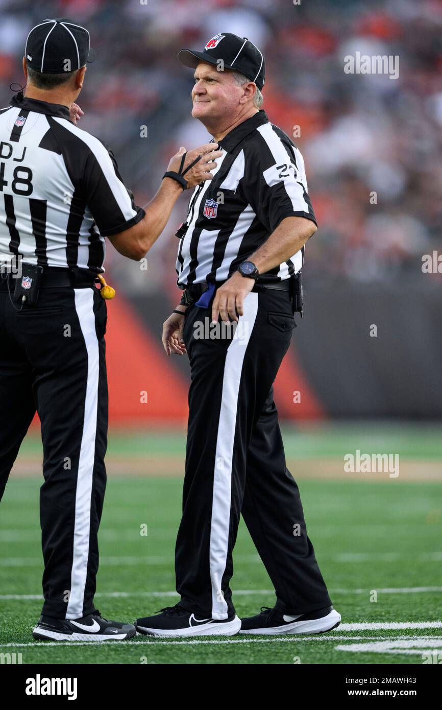 NFL down judge Jim Mello (48) and NFL side judge Jeff Lamberth (21) on