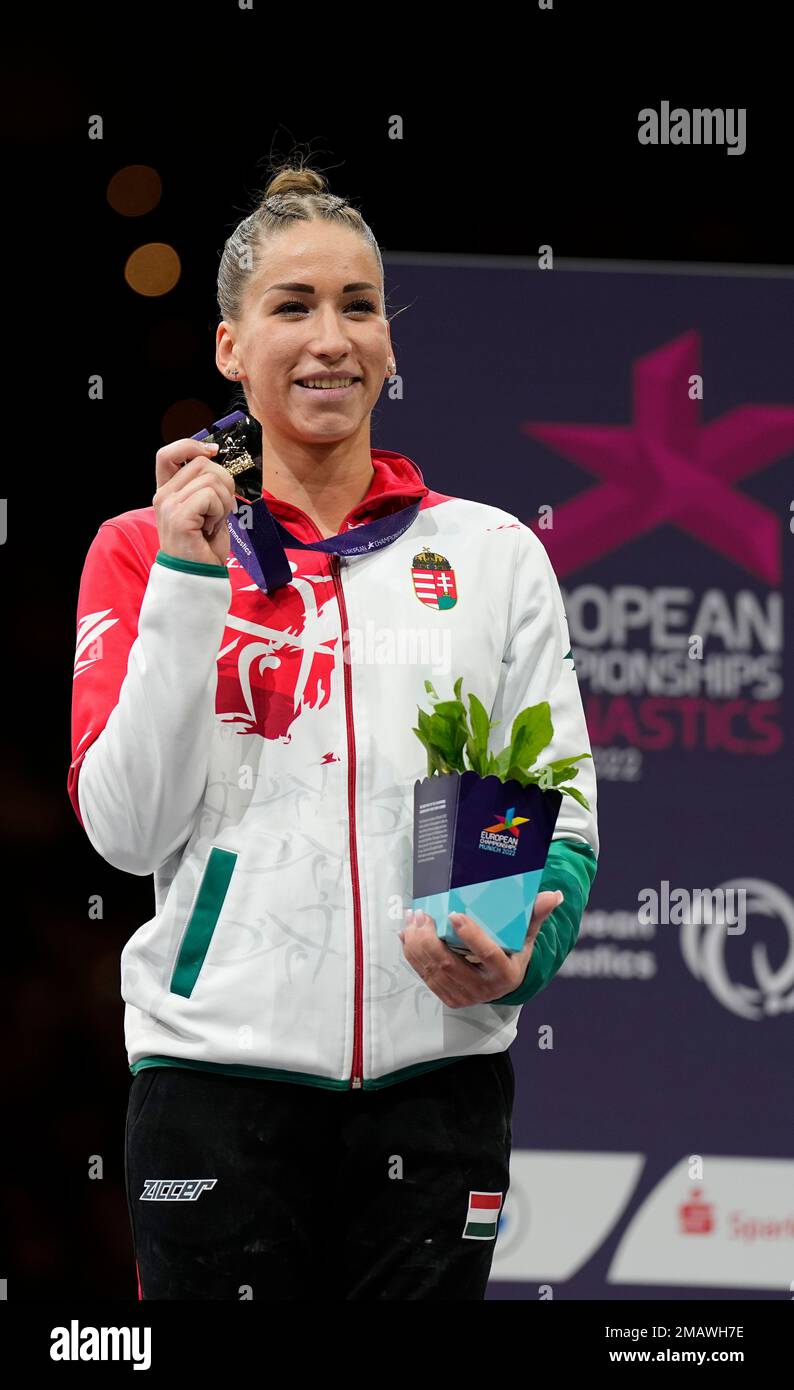 Hungary's Zsofia Kovacs poses on the podium after winning the gold