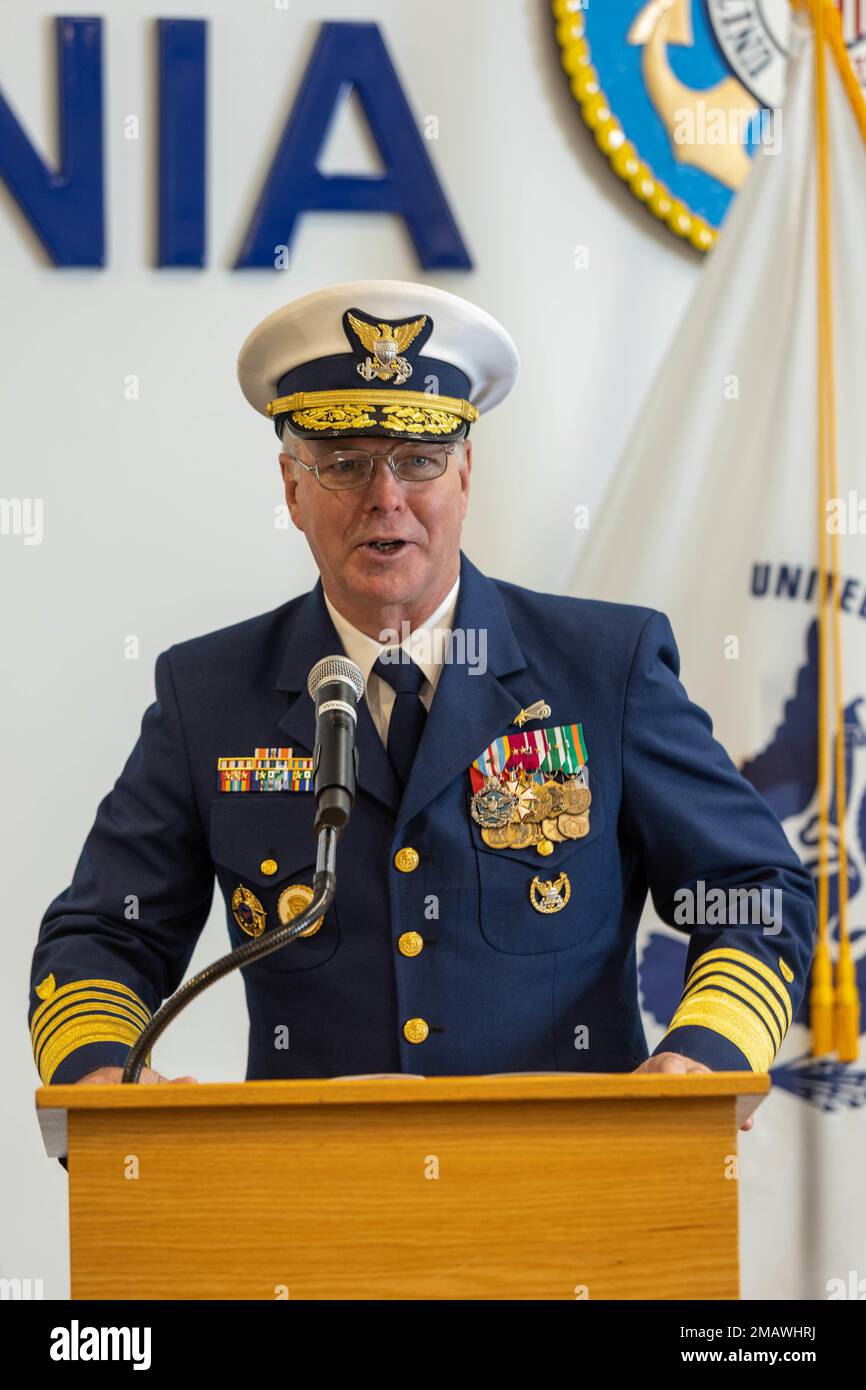 Adm. Steven Poulin, 33rd Vice Commandant of the U.S. Coast Guard, speaks at the Change of Watch ceremony for U.S. Coast Guard Atlantic Area's incoming Command Master Chief Jeremy DeMello, in Portsmouth, Virginia, June 6, 2022. The tradition is rich in military history to allow subordinated to witness the formality of command change from one leader to another. Stock Photo