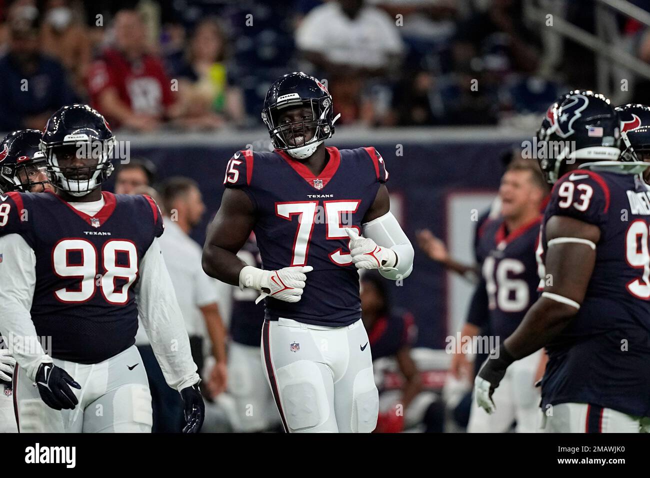 Houston Texans defensive end Adedayo Odeleye (75) walks toward the