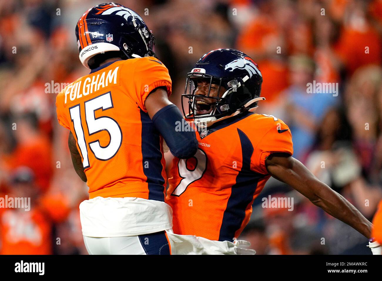 Denver Broncos wide receiver Kendall Hinton (9) celebrates his touchdown  with wide receiver Travis Fulgham (15) during the first half of an NFL  preseason football game against the Dallas Cowboys, Saturday, Aug.