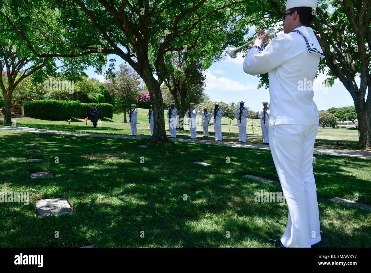 Sailors assigned to Navy Region Hawaii and the Defense POW/MIA Accounting Agency (DPAA) conduct an internment ceremony for U.S. Navy Fire Controlman 2nd Class George Gilbert, 20, of Indianapolis, at the National Memorial Cemetery of the Pacific, Honolulu, HI, June 6, 2022. Gilbert was assigned to the USS Oklahoma, which sustained fire from Japanese aircraft and multiple torpedo hits causing the ship to capsize and resulted in the deaths of more than 400 crew members on Dec. 7, 1941, at Ford Island, Pearl Harbor. Gilbert was recently identified through DNA analysis by the DPAA forensic laborato Stock Photo