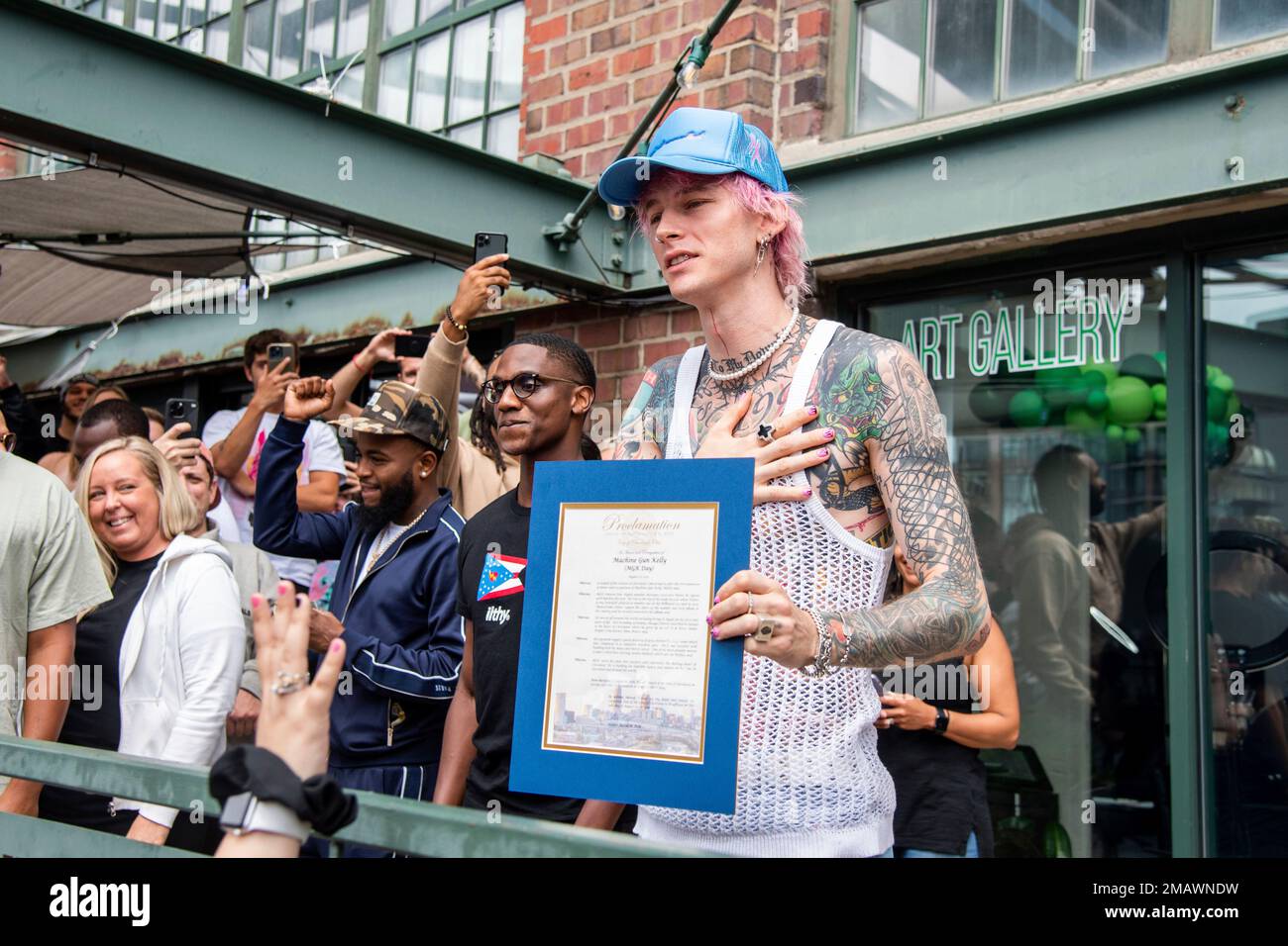 City of Cleveland Mayor Justin M. Bibb, left, and Machine Gun Kelly are