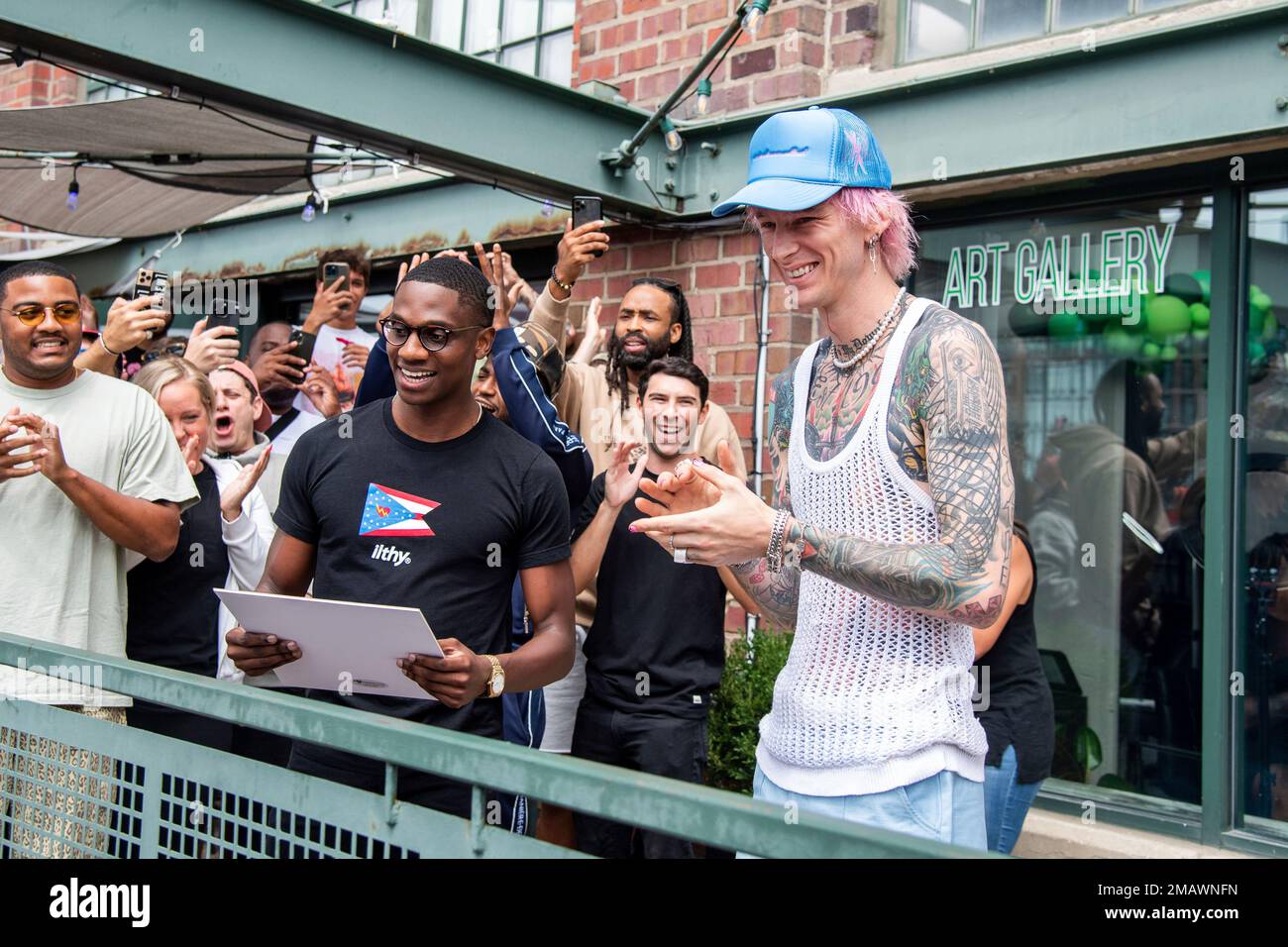 City of Cleveland Mayor Justin M. Bibb, left, and Machine Gun Kelly are