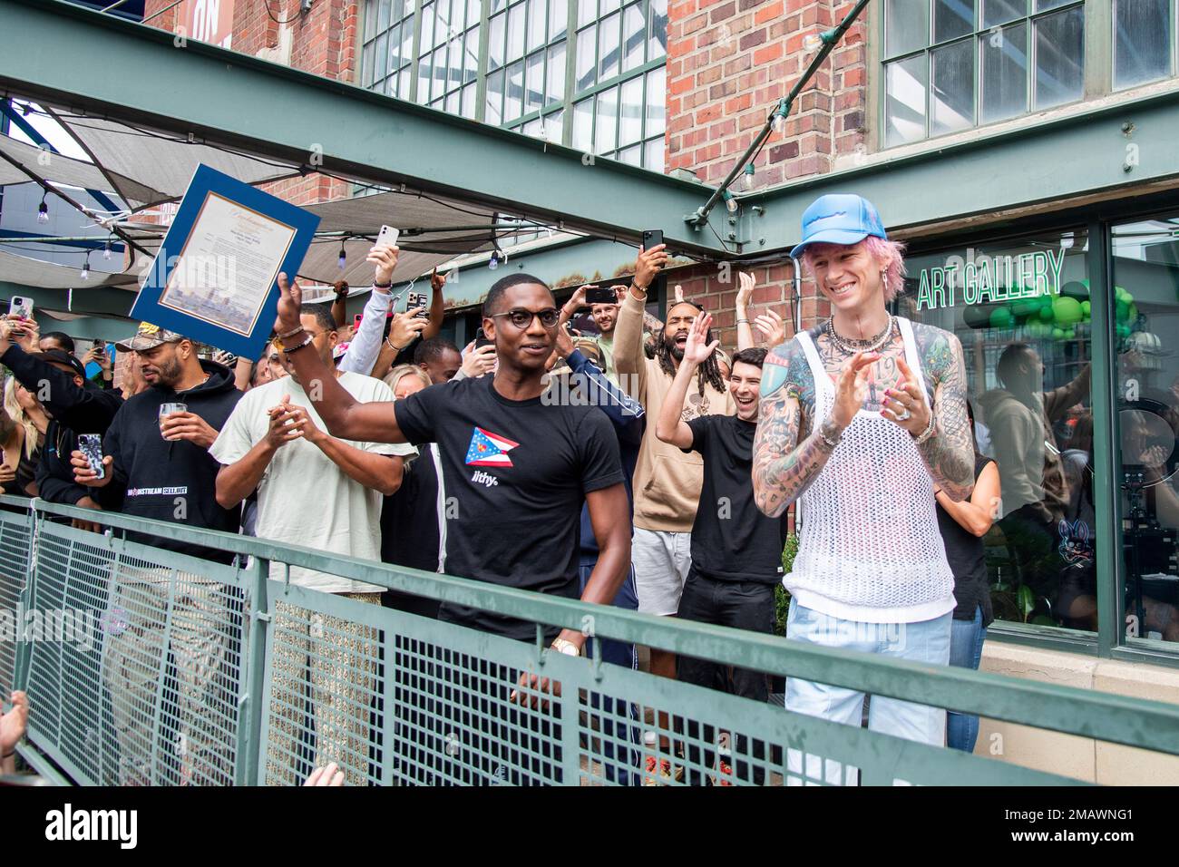 City of Cleveland Mayor Justin M. Bibb, left, and Machine Gun Kelly are