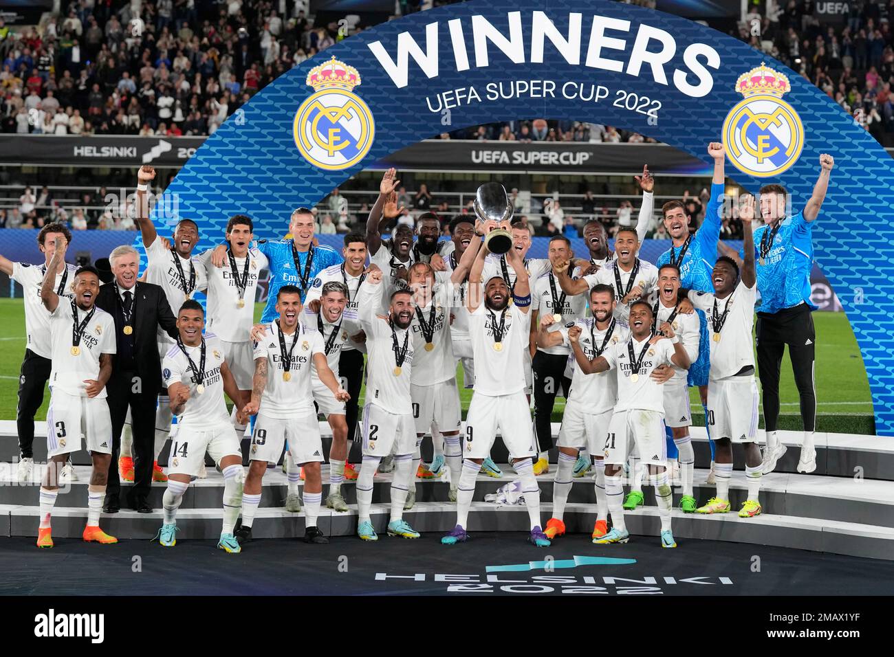 Real Madrid's Karim Benzema lifts the trophy after winning the UEFA ...