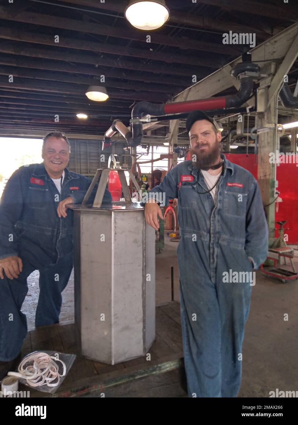 Duane Frye (left) and Dakota Johnson (right), BAE Systems, Inc., stand