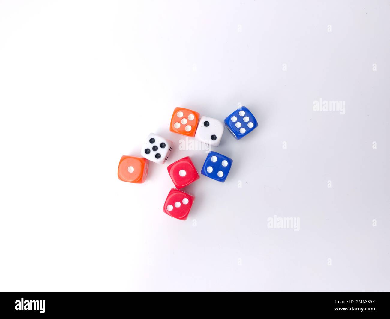 Colored dice isolated on a white background Stock Photo