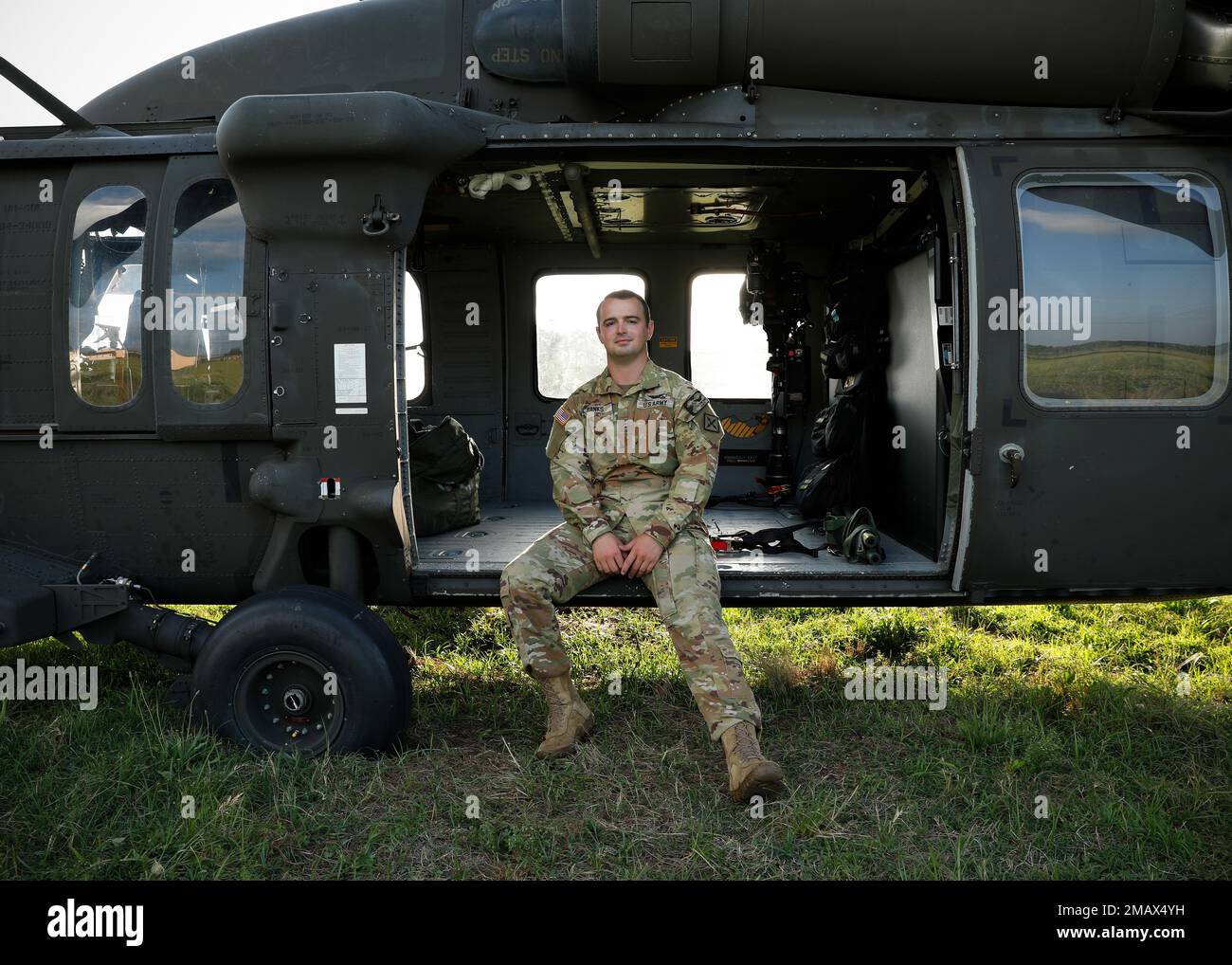 FORT CHAFFEE, ARKANSAS - Today's Soldier of the Day is Chief Warrant Officer 2nd Grade Rynne Banks of Springdale, Ark. Chief Banks is a Medical Evacuation Pilot with G Company 3-238th General Support Aviation Battalion.   Banks and his crew run mission essential casualty evacuation flights for the 39th Infantry Brigade Combat Team and the 77th Combat Aviation Brigade in a UH-60L Blackhawk Helicopter.   When he's not in the air you can find Banks in the lecture hall at UALR where he is a full-time student seeking a Bachelors of Science in Physics. His time in the air and his time in the classro Stock Photo