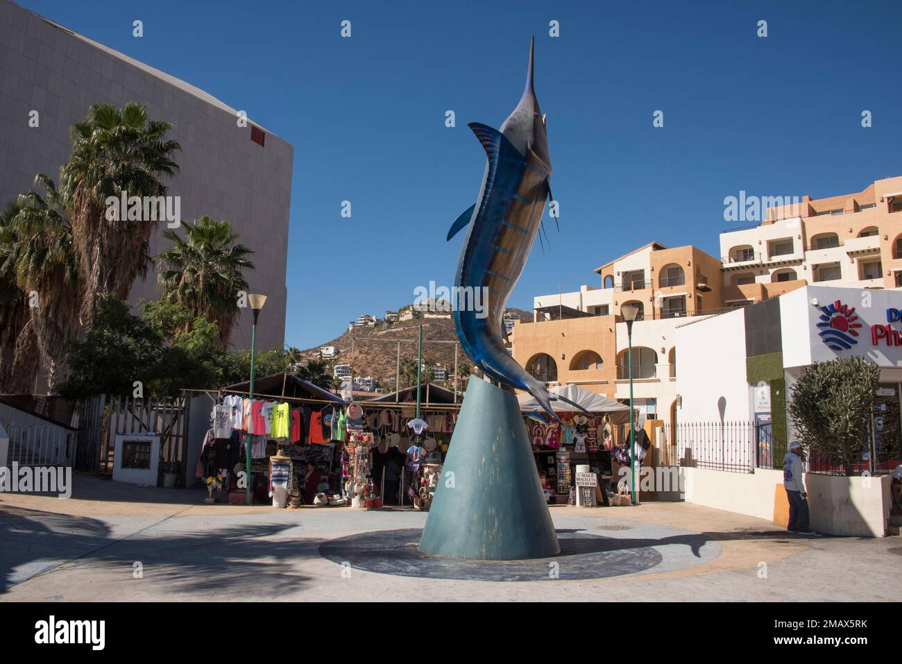 A statue of a swordfish or marlin adorns the main plaza of the harbor of Cabo San Lucas, Mexican Riviera, Mexico Stock Photo