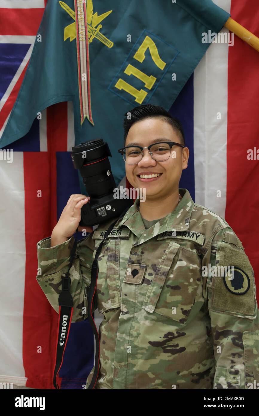Hawaii Army National Guard Spc. Casandra B. Ancheta, a mass communications specialist assigned to the 117th Mobile Public Affairs Detachment, 103rd Troop Command, poses with her camera at Pearl City, Hawaii, June 6, 2022. Ancheta enlisted in the HIARNG in 2016. Stock Photo