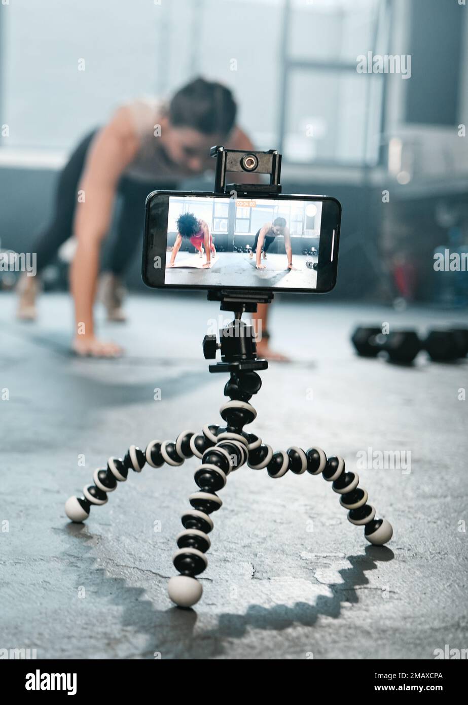 Influencer, phone and fitness women recording, filming or broadcast