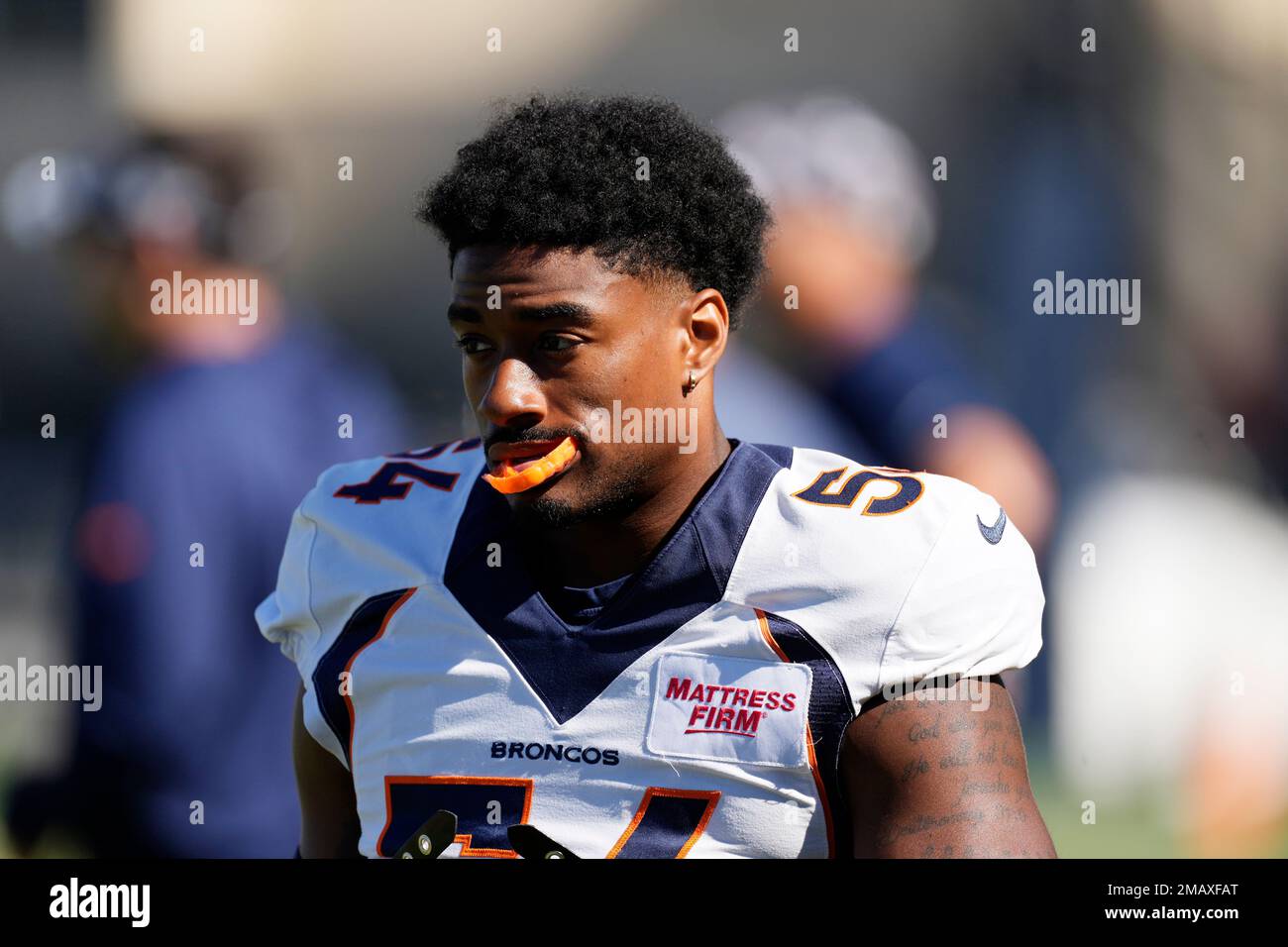 Denver Broncos inside linebacker Barrington Wade takes the practice field  during the NFL football team's training camp Tuesday, Aug. 2, 2022, at the  team's headquarters in Centennial, Colo. (AP Photo/David Zalubowski Stock