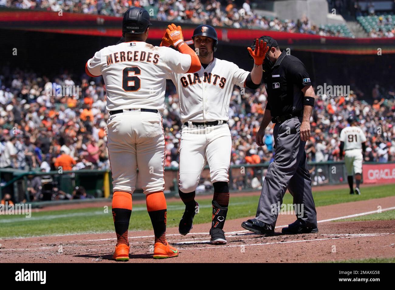 San Francisco Giants' J.D. Davis, right, is congratulated by