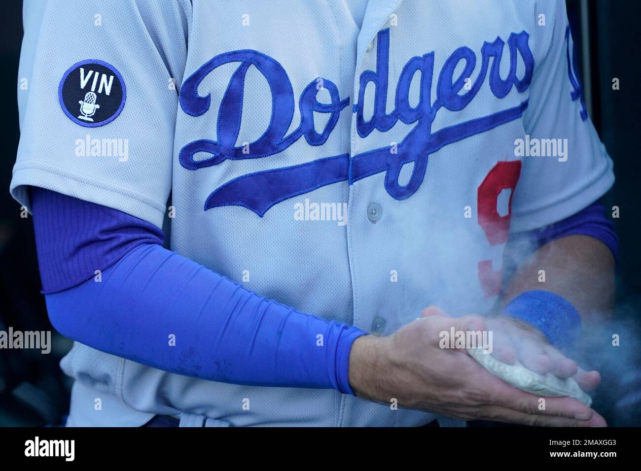 A patch for announcer Vin Scully is shown on the jersey of Los Angeles  Dodgers' Gavin Lux before a baseball game between the San Francisco Giants  and the Dodgers in San Francisco