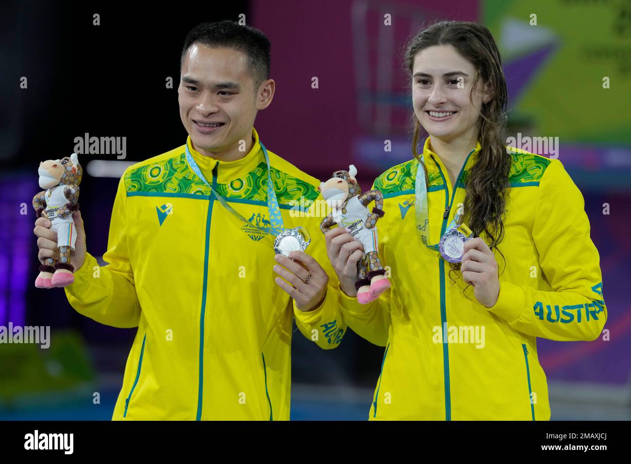 Australia's Maddison Keeney, right, and Shixin Li pose with their silver medals during the medal