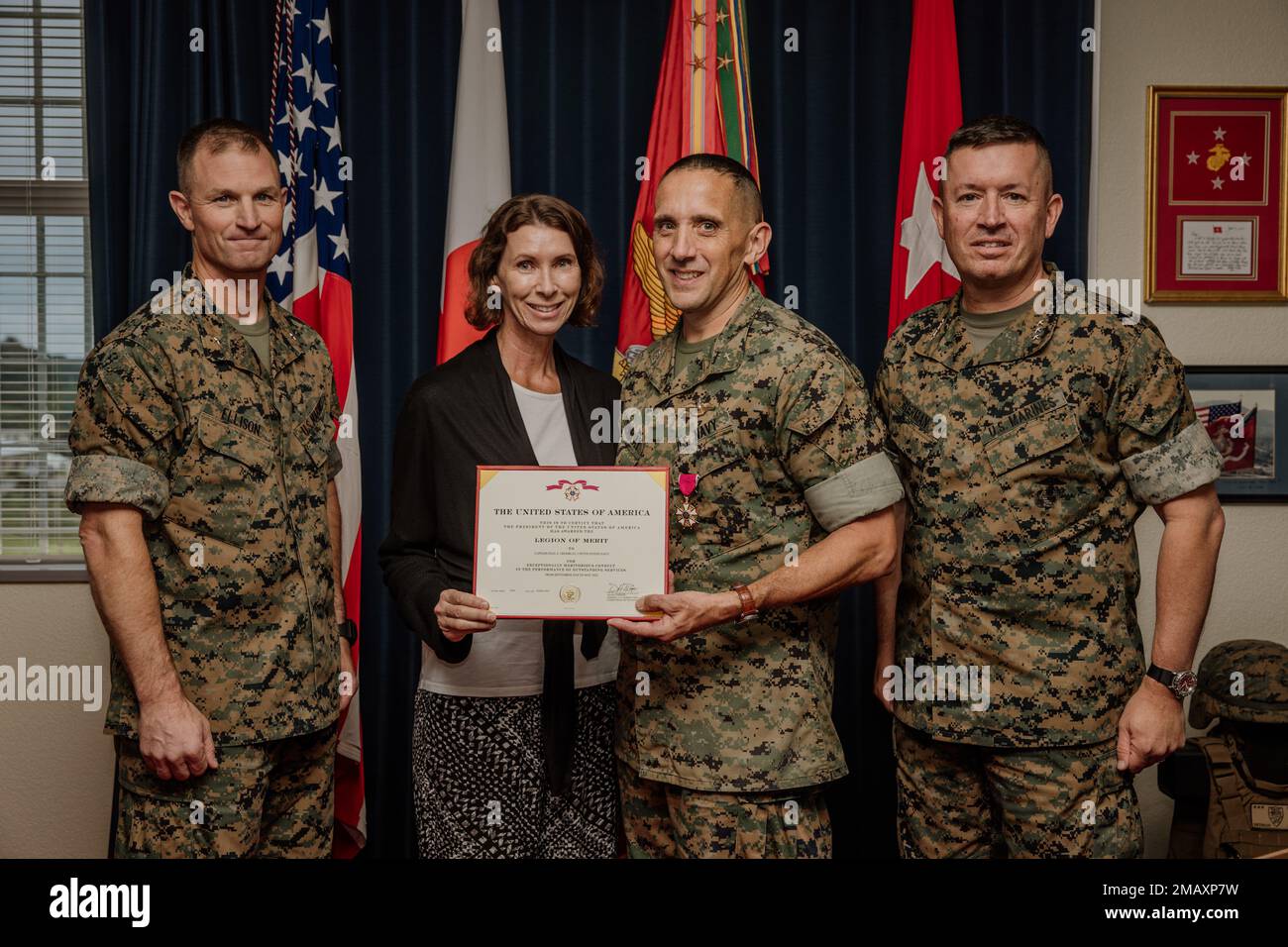 U.S. Navy Capt. Paul Tremblay, the III Marine Expeditionary Force (III MEF) Chaplain, receives the Legion of Merit on Camp Courtney, Okinawa, Japan, June 7, 2022. Trembley was awarded for his dedicated and faithful service to III MEF. Stock Photo