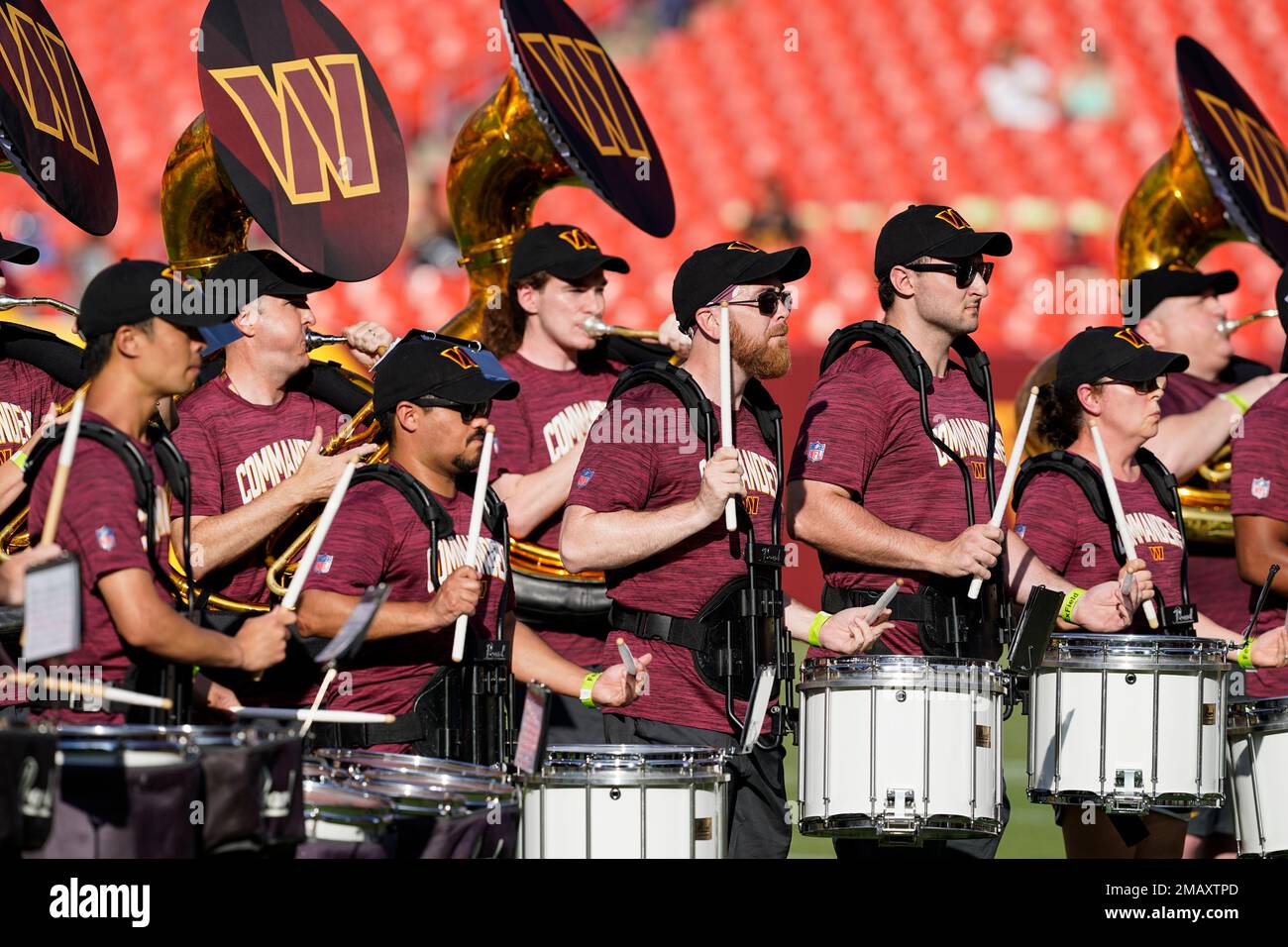 The Washington Commanders marching band performs before an NFL football