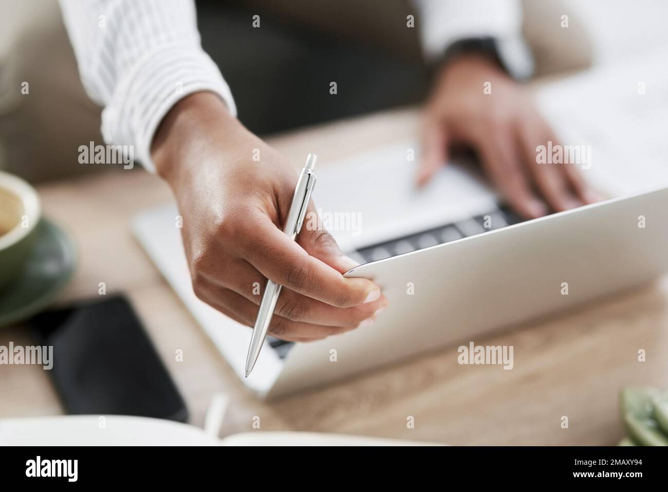 Businessman holding pen typing hi-res stock photography and images - Alamy