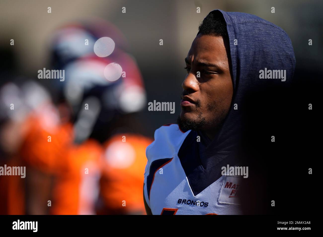 Denver Broncos linebacker Nik Bonitto walks off the field after a preseason  NFL football game against the Buffalo Bills in Orchard Park, N.Y.,  Saturday, Aug. 20, 2022. (AP Photo/Adrian Kraus Stock Photo 