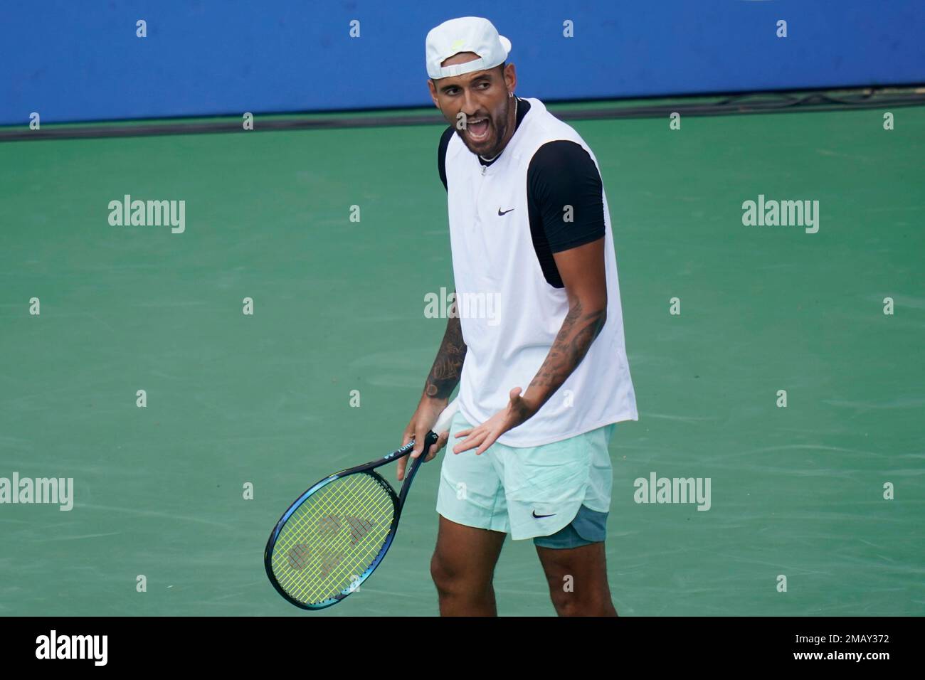 Nick Kyrgios, of Australia, reacts during a match against Reilly Opelka, of the United States, during a match at the Citi Open tennis tournament in Washington, Friday, Aug