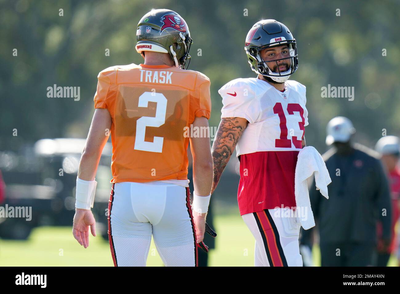 Tampa Bay Buccaneers wide receiver Mike Evans (13) talks to quarterback Kyle Trask during an NFL