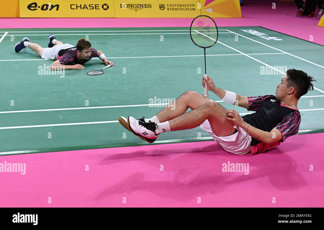 Canada's Adam Dong, left, and Nyl Kiyoshi Yakura react during the Badminton  Men's Doubles Round game against England's Sean Vardy and Ben Lane at the  Commonwealth Games in Birmingham, England, Friday, Aug.