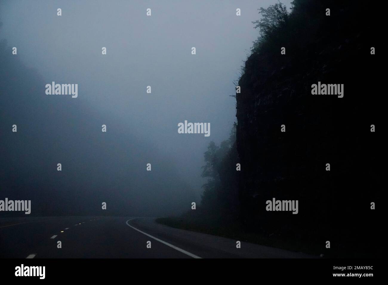 Heavy fog fills the hills and road on Wednesday, Aug. 3, 2022, in