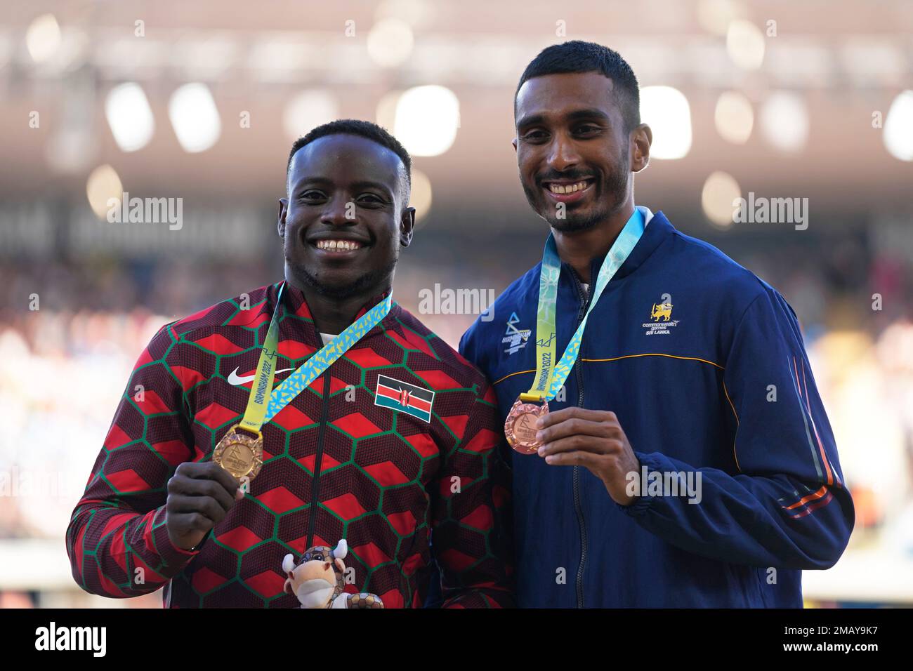 Gold medalist Ferdinand Omanyala of Kenya and bronze medalist Yupun
